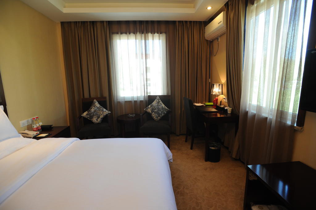 Wanrun International Resort Hotel In Tibet Xigaze Номер фото
